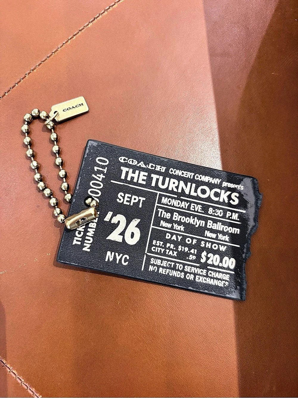 Coach The Turnlocks Keychain Black & Gold bag charm